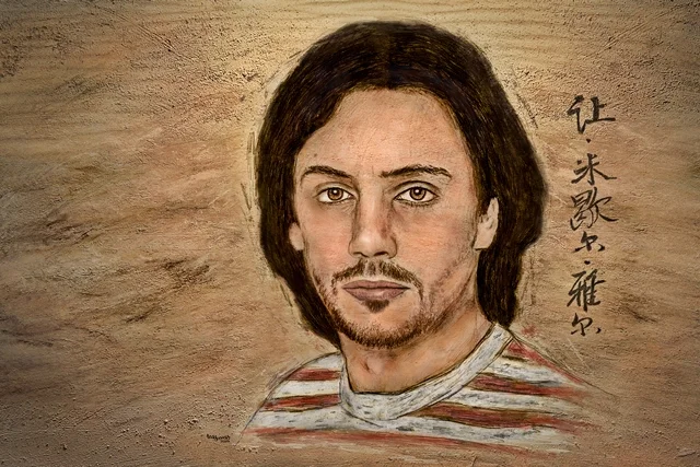 Porträt von Jean-Michel Jarre in einer asiatisch inspirierten Fan-Art-Darstellung von teddynash. Der Musiker blickt direkt zum Betrachter, während chinesische Schriftzeichen und warme Erdtöne dem Bild eine ruhige, fernöstliche Atmosphäre verleihen.